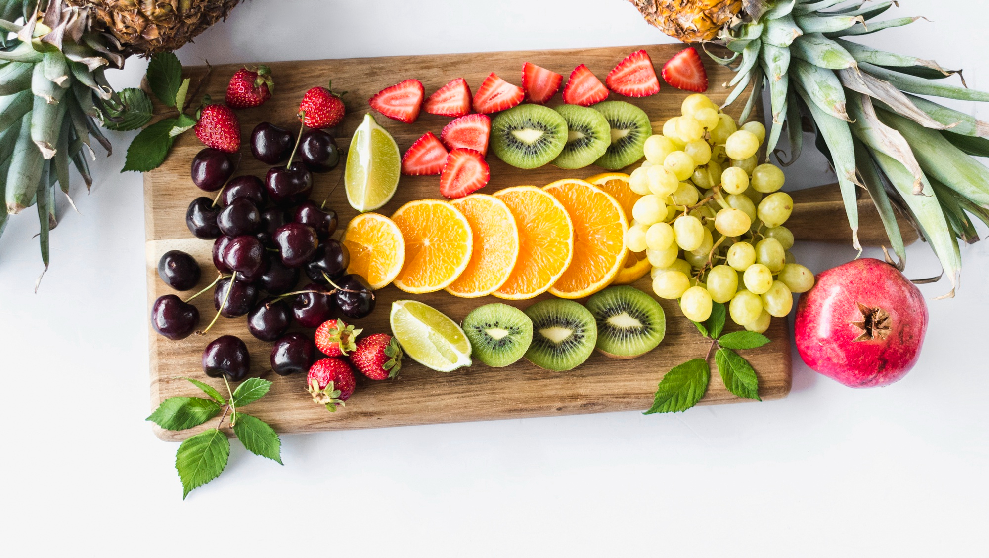 An editorial planning desk with a weekly food notebook
